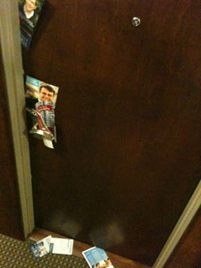 Ward 27 campaign flyers in a door